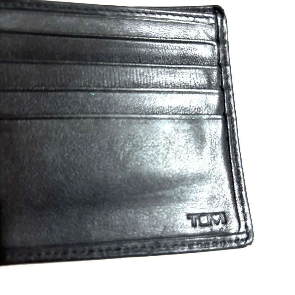 Tumi Sleek Black distressed Leather Wallet